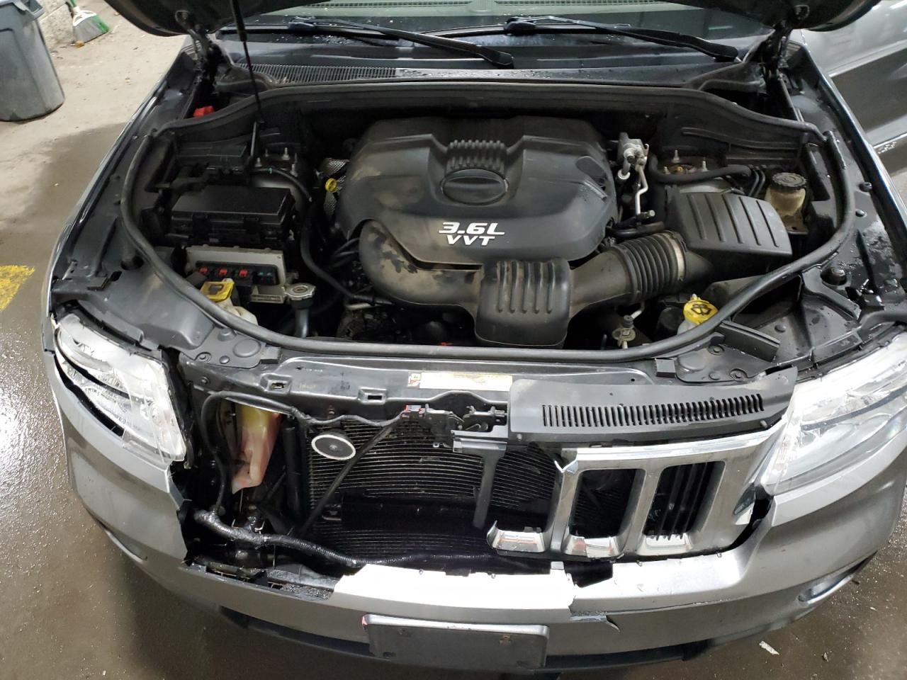 2012 Jeep Grand Cherokee VIN 1C4RJFAGXCC197166 Copart auction photo, front end damage thumbnail 13
