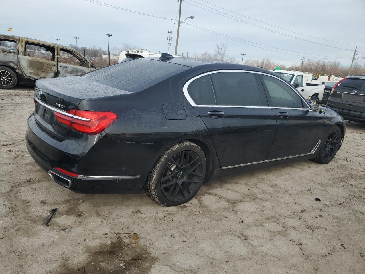 2016 BMW 7er VIN WBA7F2C51GG415164 Copart auction photo, side / front end damage thumbnail 3