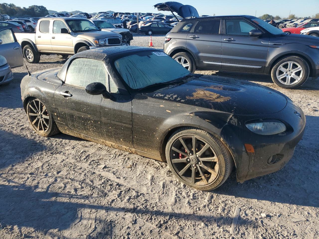 2007 Mazda MX-5 VIN JM1NC26F570129706 Copart auction photo, water/flood damage thumbnail 4