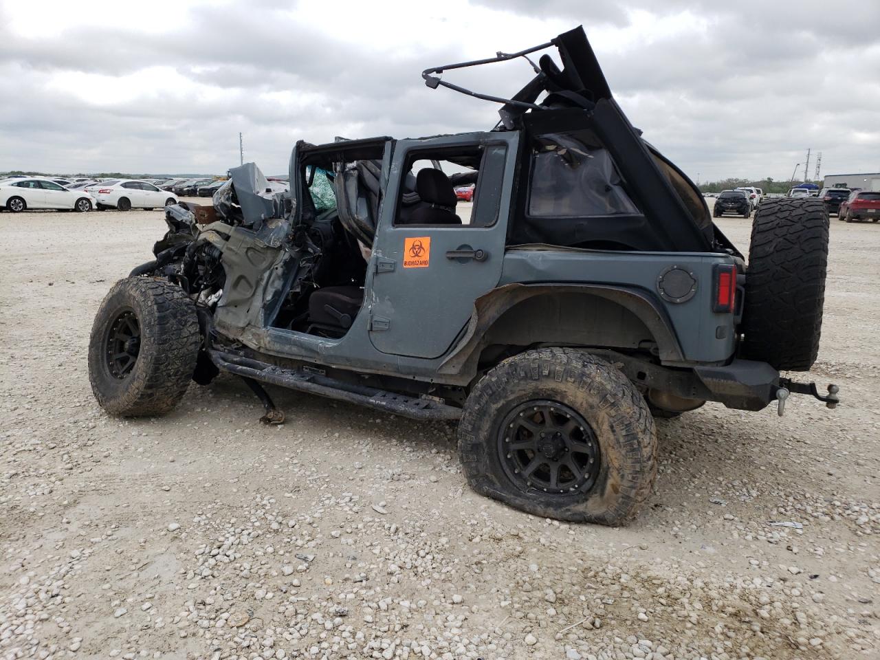 2014 Jeep Wrangler VIN 1C4BJWDG7EL134686 Copart auction photo, rollover damage thumbnail 2