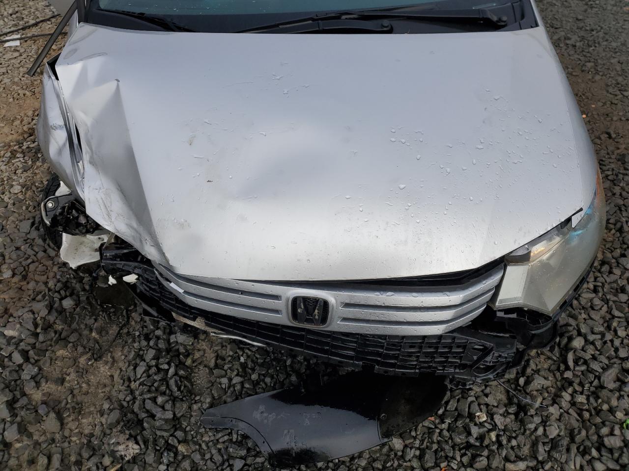 2010 Honda Insight VIN JHMZE2H55AS018549 Copart auction photo, side / front end damage thumbnail 11