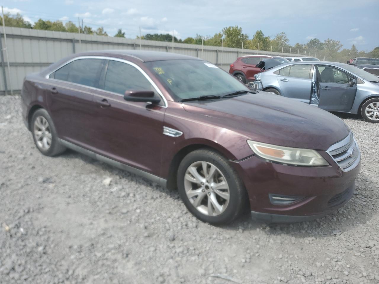 2011 Ford Taurus VIN 1FAHP2EW9BG165004 Copart auction photo, side damage thumbnail 4