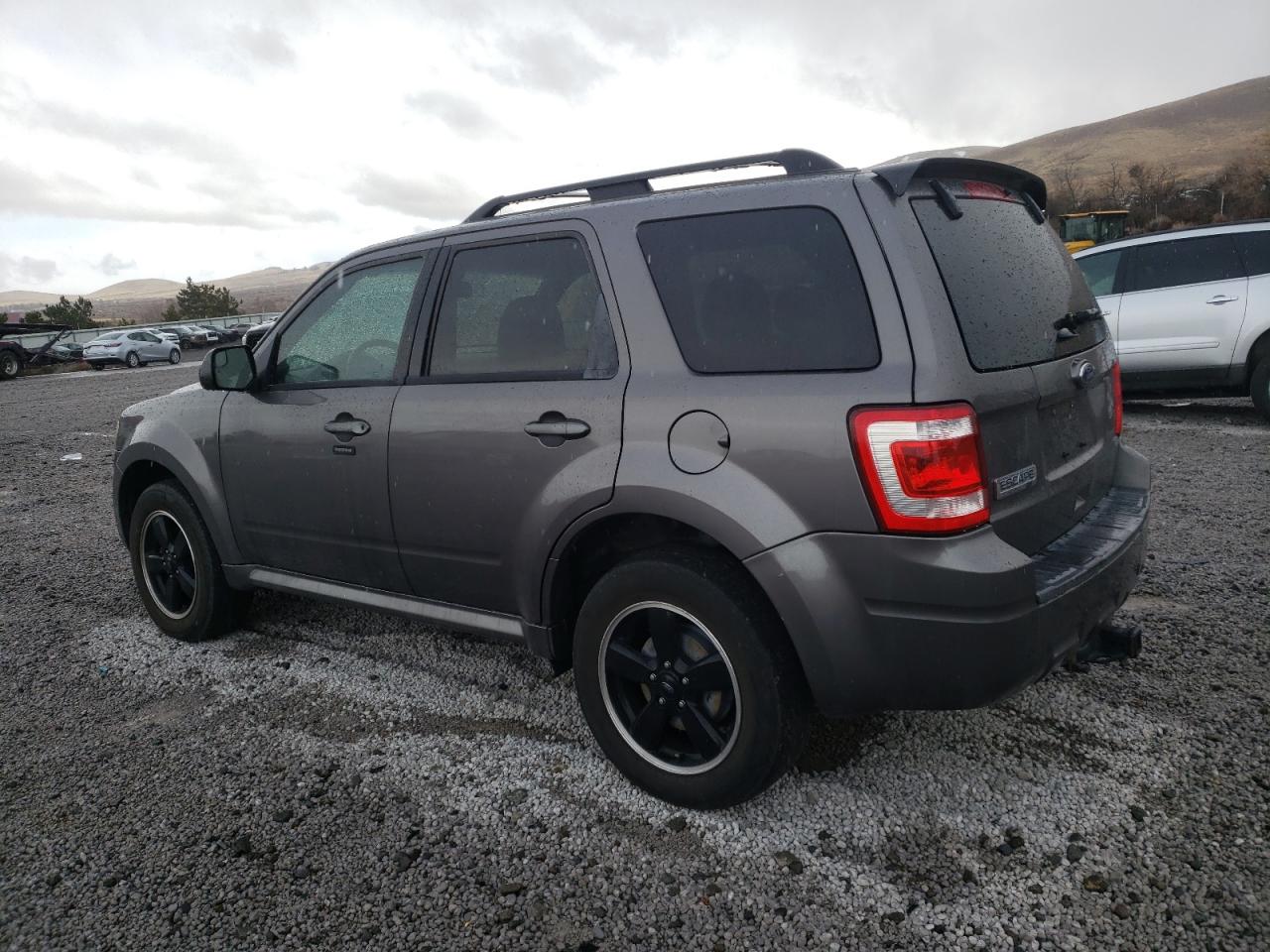 2011 Ford Escape VIN 1FMCU9DG9BKC10984 Copart auction photo, side damage thumbnail 2