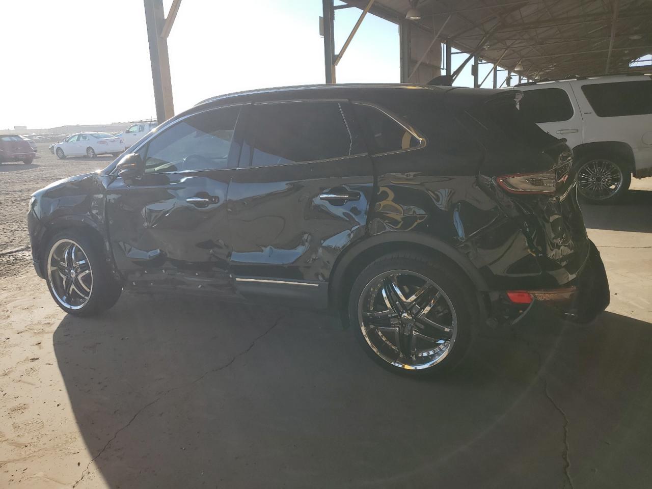 2019 Lincoln MKC VIN 5LMCJ3C91KUL00723 Copart auction photo, rear end / side damage thumbnail 2
