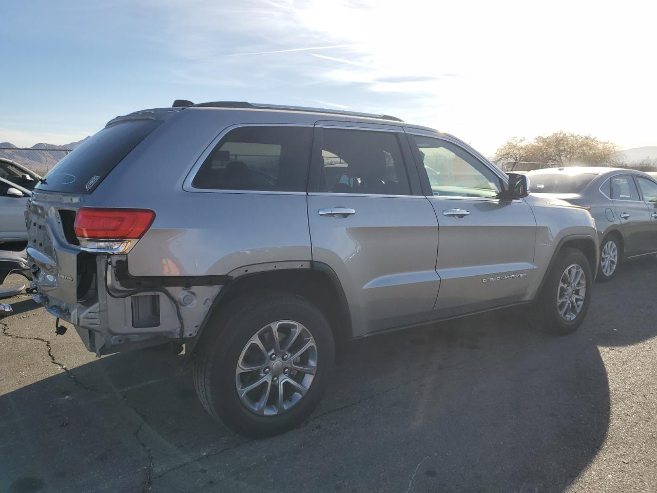 2014 Jeep Grand Cherokee VIN 1C4RJFBG2EC411696 Copart auction photo, rear end damage thumbnail 3