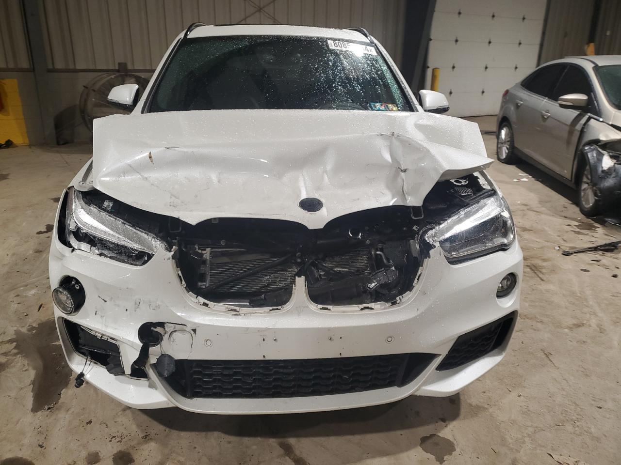 2017 BMW X1 VIN WBXHT3C34H5F82903 Copart auction photo, front end damage thumbnail 5