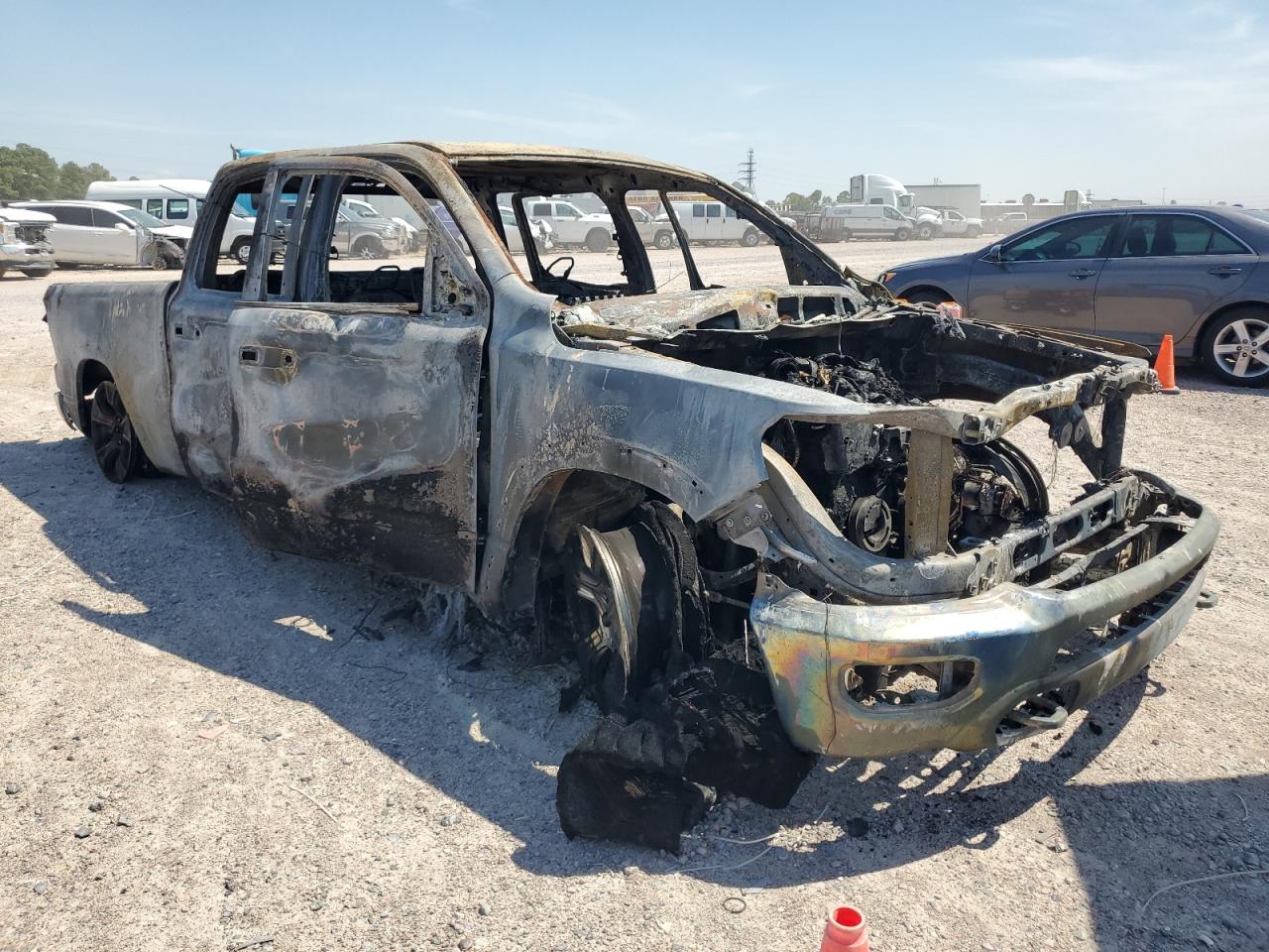 2021 RAM 1500 VIN 1C6SRFRM4MN589531 Copart auction photo, burn damage thumbnail 4