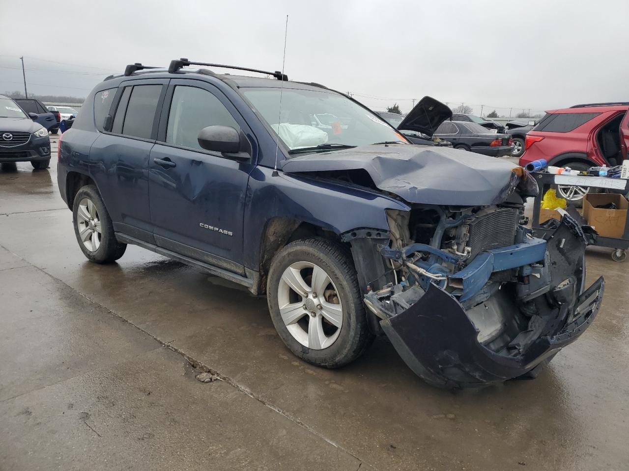 2012 Jeep Compass VIN 1C4NJCEB4CD660554 Copart auction photo, front end / side damage thumbnail 4