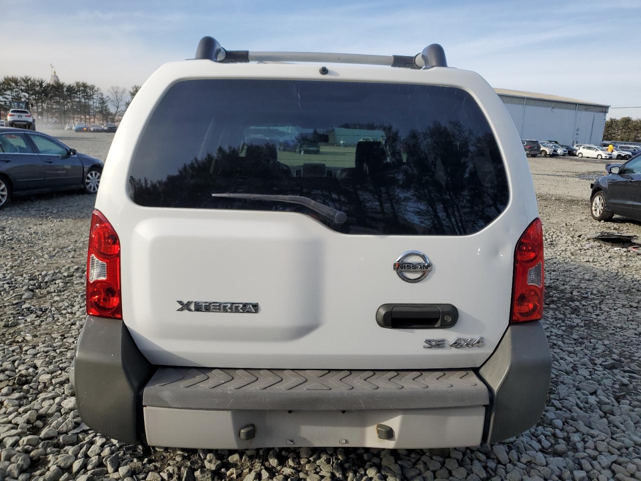 2010 Nissan XTerra VIN 5N1AN0NWXAC502786 Copart auction photo, front end / side damage thumbnail 6