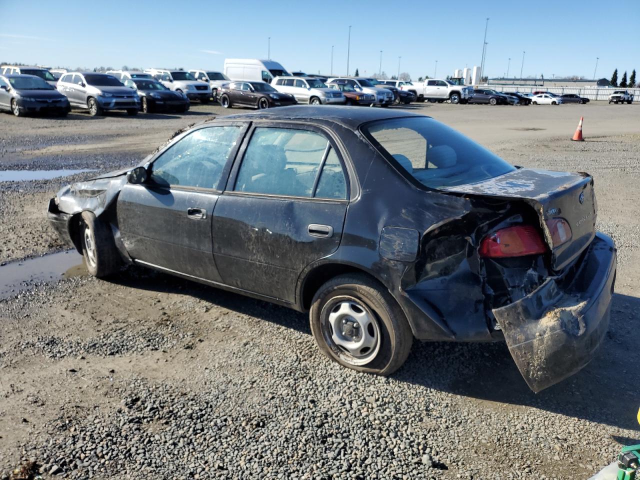 1999 Toyota Corolla VIN 1NXBR12E1XZ245787 Copart auction photo, all over damage thumbnail 2
