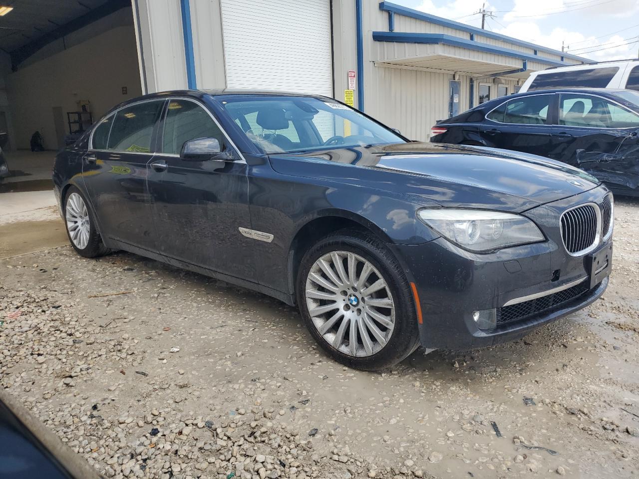 2012 BMW 7er VIN WBAKC8C55CC436848 Copart auction photo, rear end / minor dent/scratches damage thumbnail 4