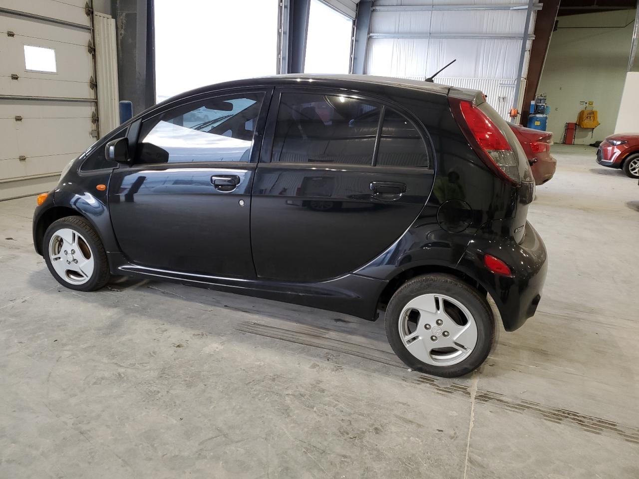 2012 Mitsubishi i-MiEV VIN JA3215H17CU029376 Copart auction photo, minor dent/scratches damage thumbnail 2