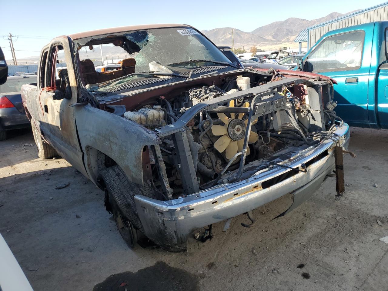 1999 Chevrolet Silverado VIN 1GCEK19T5XE143297 Copart auction photo, burn damage thumbnail 4