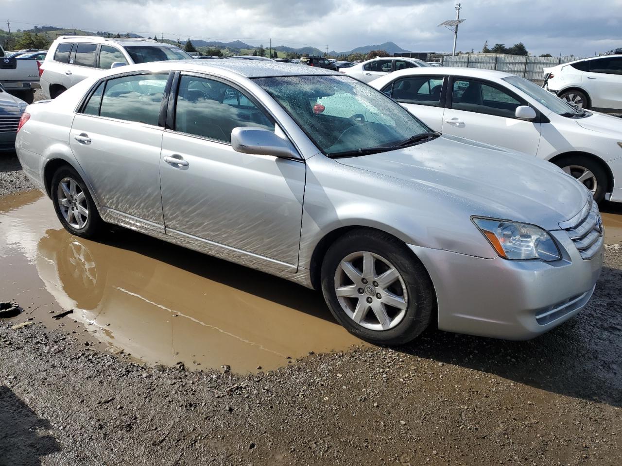 2006 Toyota Avalon VIN 4T1BK36B96U104335 Copart auction photo, side / rear end damage thumbnail 4