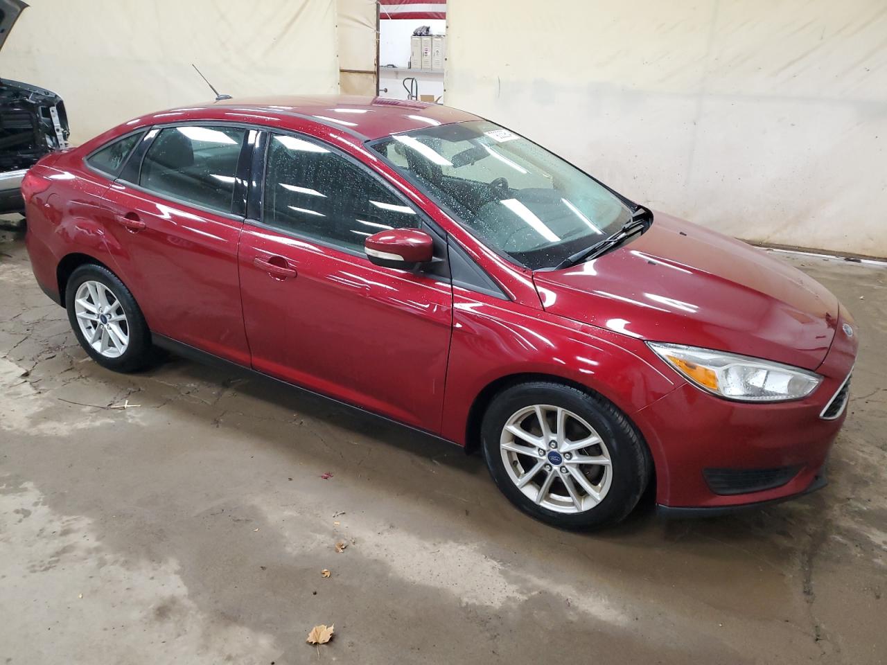 2015 Ford Focus VIN 1FADP3F21FL293282 Copart auction photo, side / rear end damage thumbnail 4