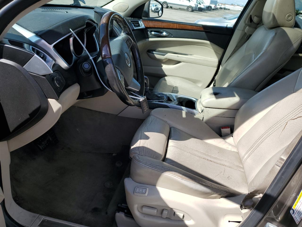 2012 Cadillac SRX VIN 3GYFNBE38CS579062 Copart auction photo, rear end damage thumbnail 7