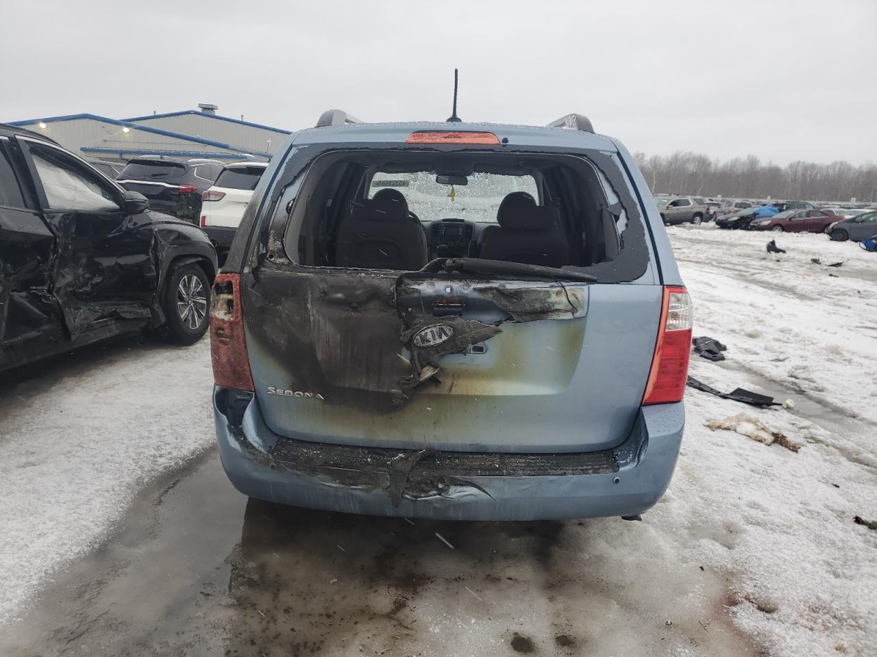 2010 KIA Sedona VIN KNDMG4C36A6334249 Copart auction photo, burn / rear end damage thumbnail 6