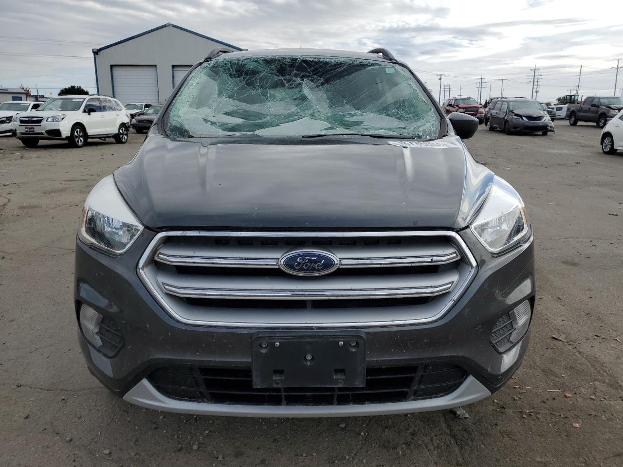 2018 Ford Escape VIN 1FMCU9GD4JUD22693 Copart auction photo, all over damage thumbnail 5