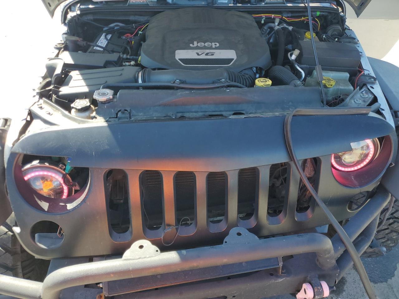 2016 Jeep Wrangler VIN 1C4AJWAGXGL142896 Copart auction photo, front end / side damage thumbnail 12