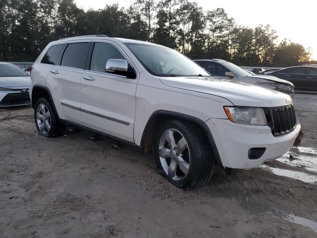 2011 Jeep Grand Cherokee VIN 1J4RS5GG9BC582905 Copart auction photo, front end damage thumbnail 4