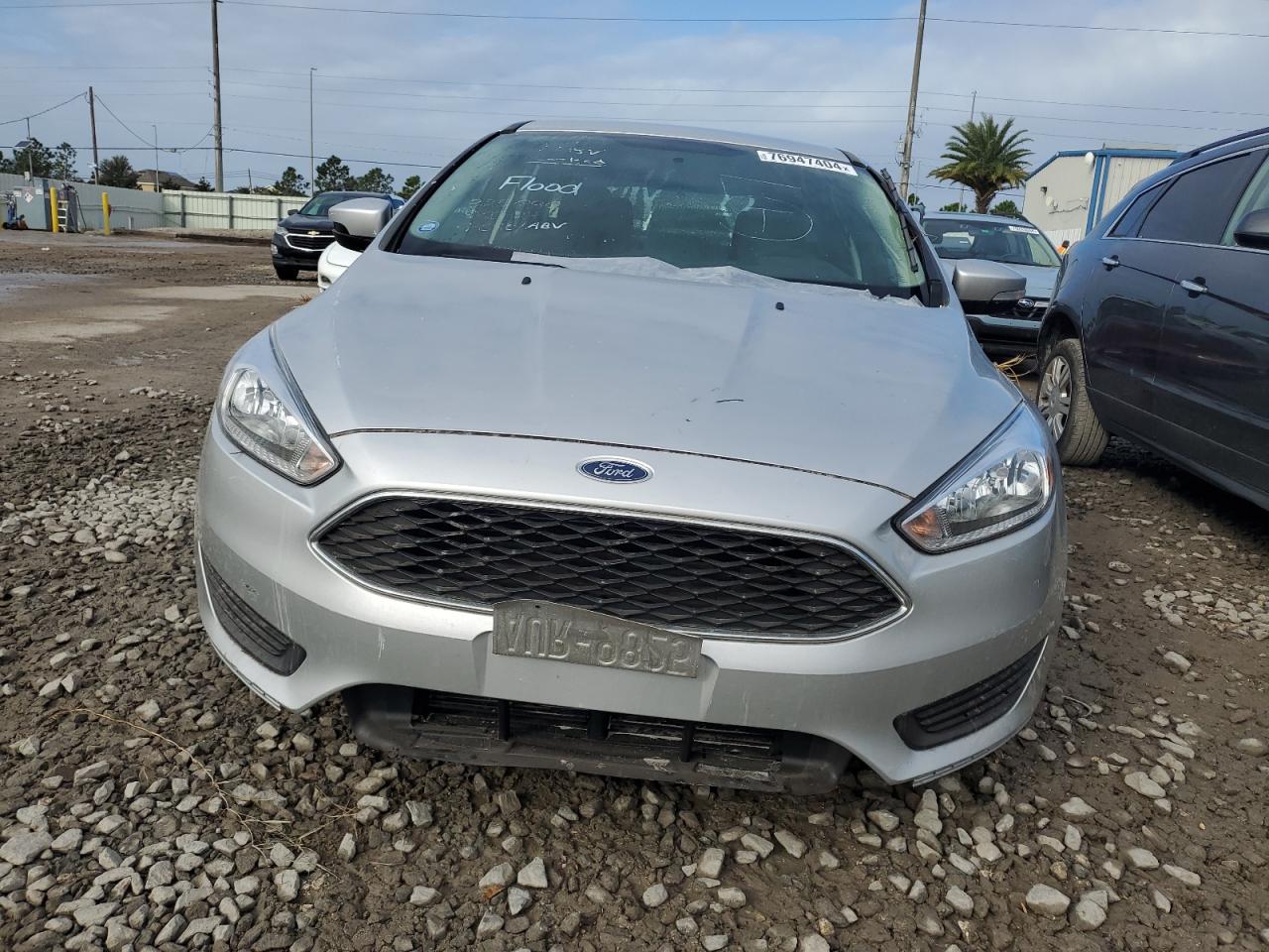 2017 Ford Focus VIN 1FADP3K29HL294723 Copart auction photo, water/flood damage thumbnail 5