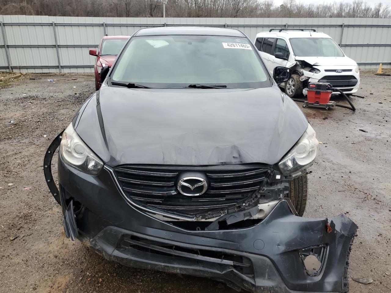 2016 Mazda CX-5 VIN JM3KE2BYXG0671086 Copart auction photo, all over damage thumbnail 5
