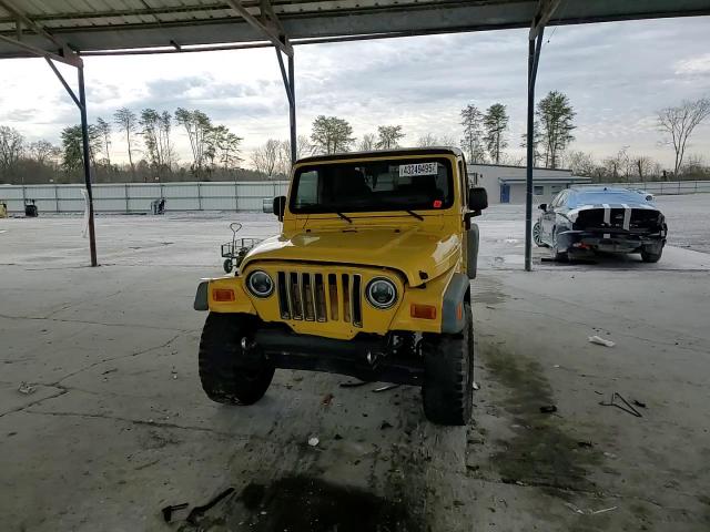 2004 Jeep Wrangler VIN 1J4FA39SX4P753507 Copart auction photo, all over damage thumbnail 11