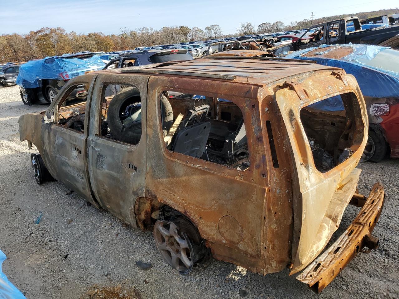 2007 Chevrolet Tahoe VIN 1GNFK13007J121547 Copart auction photo, burn damage thumbnail 2