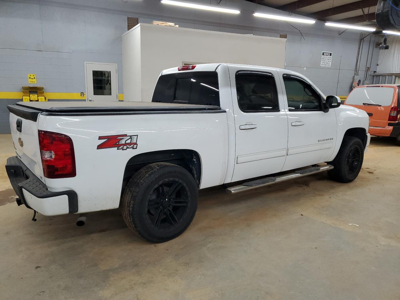 2011 Chevrolet Silverado VIN 3GCPKSE31BG201878 Copart auction photo, rear end / undercarriage damage thumbnail 3
