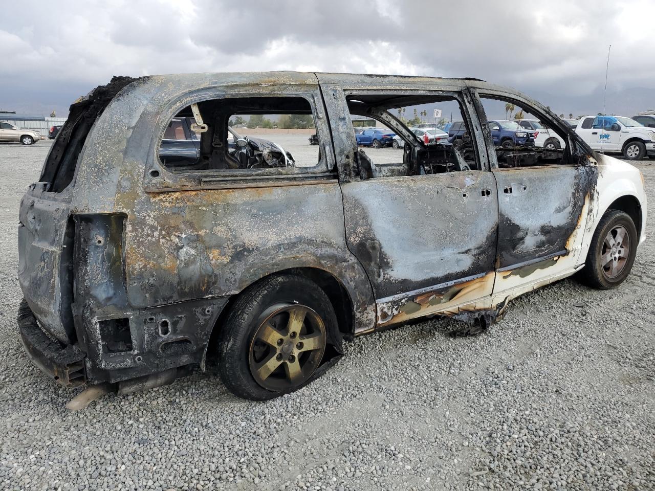 2012 Dodge Caravan VIN 2C4RDGCGXCR262843 Copart auction photo, burn damage thumbnail 3