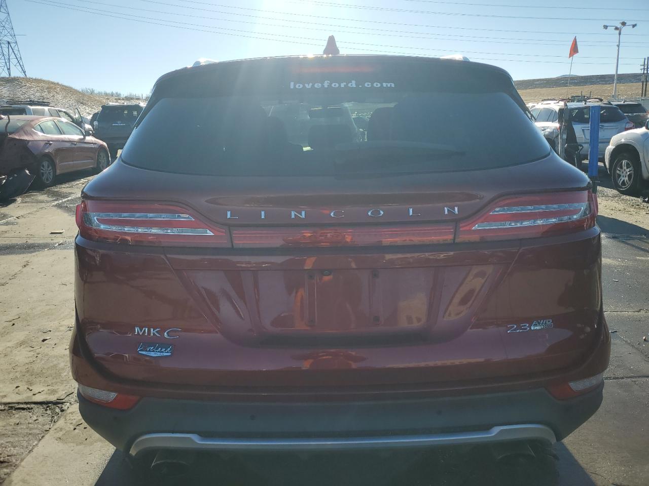 2015 Lincoln MKZ VIN 5LMTJ2AH5FUJ09185 Copart auction photo, side / front end damage thumbnail 6