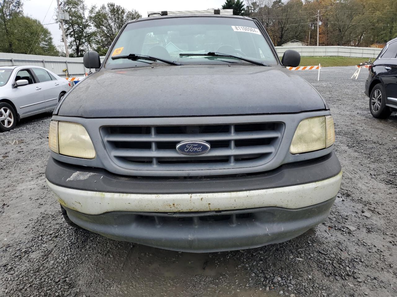 2000 Ford F-150 VIN 1FTRF17W0YKB36666 Copart auction photo, all over damage thumbnail 5
