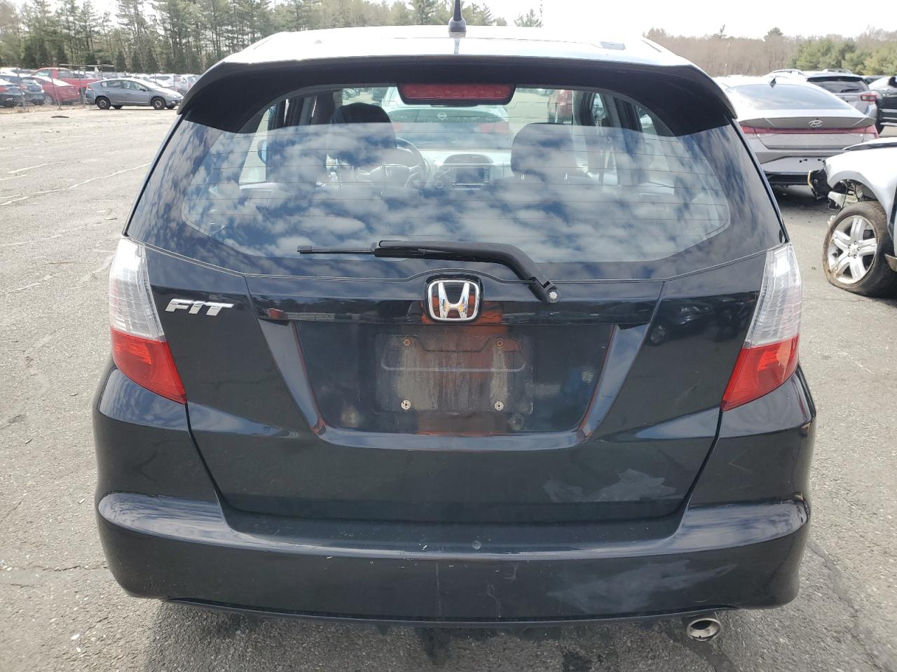 2009 Honda Fit VIN JHMGE88629S046128 Copart auction photo, side / minor dent/scratches damage thumbnail 6