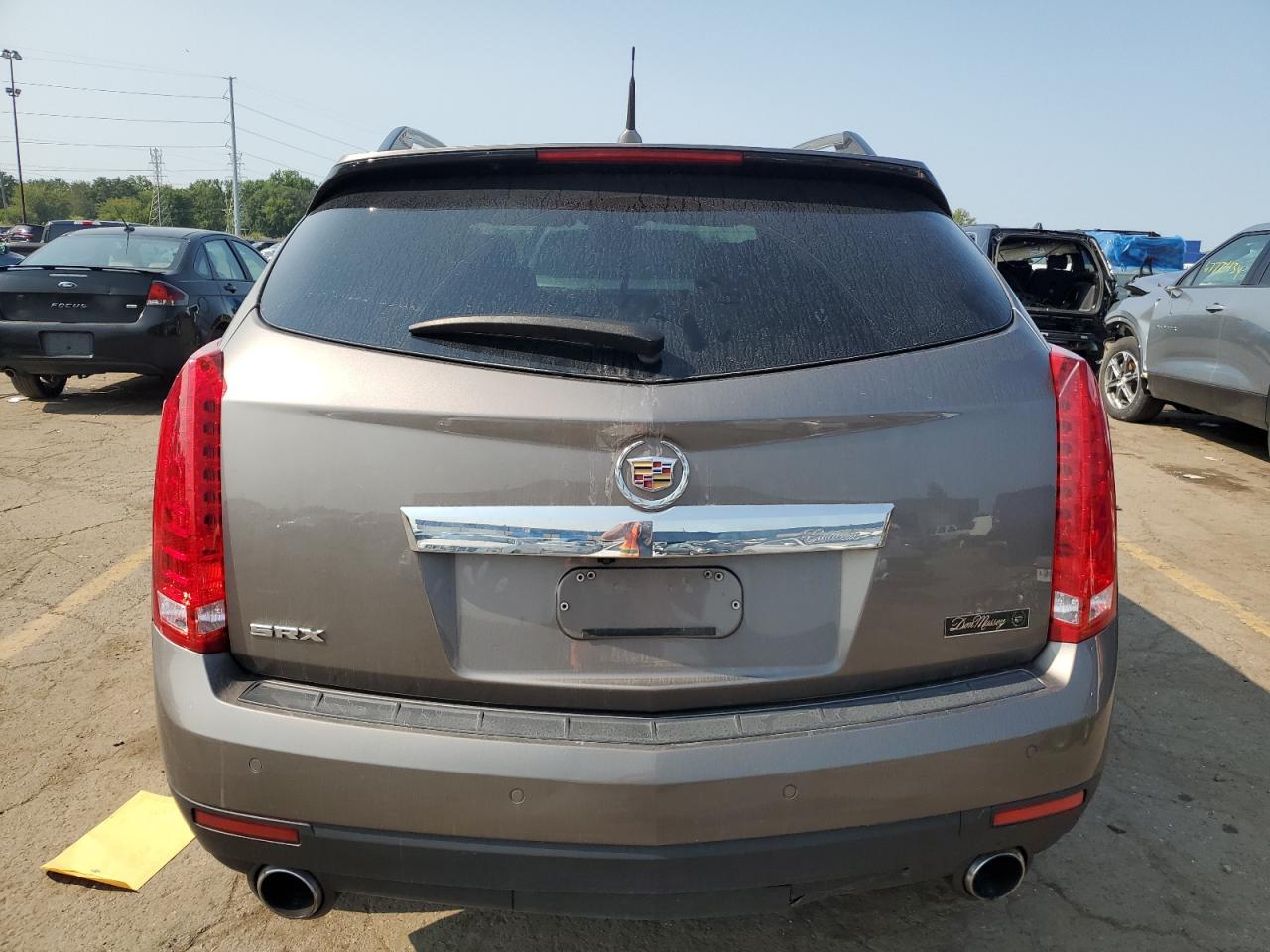 2011 Cadillac SRX VIN 3GYFNDEY7BS555132 Copart auction photo, front end damage thumbnail 6