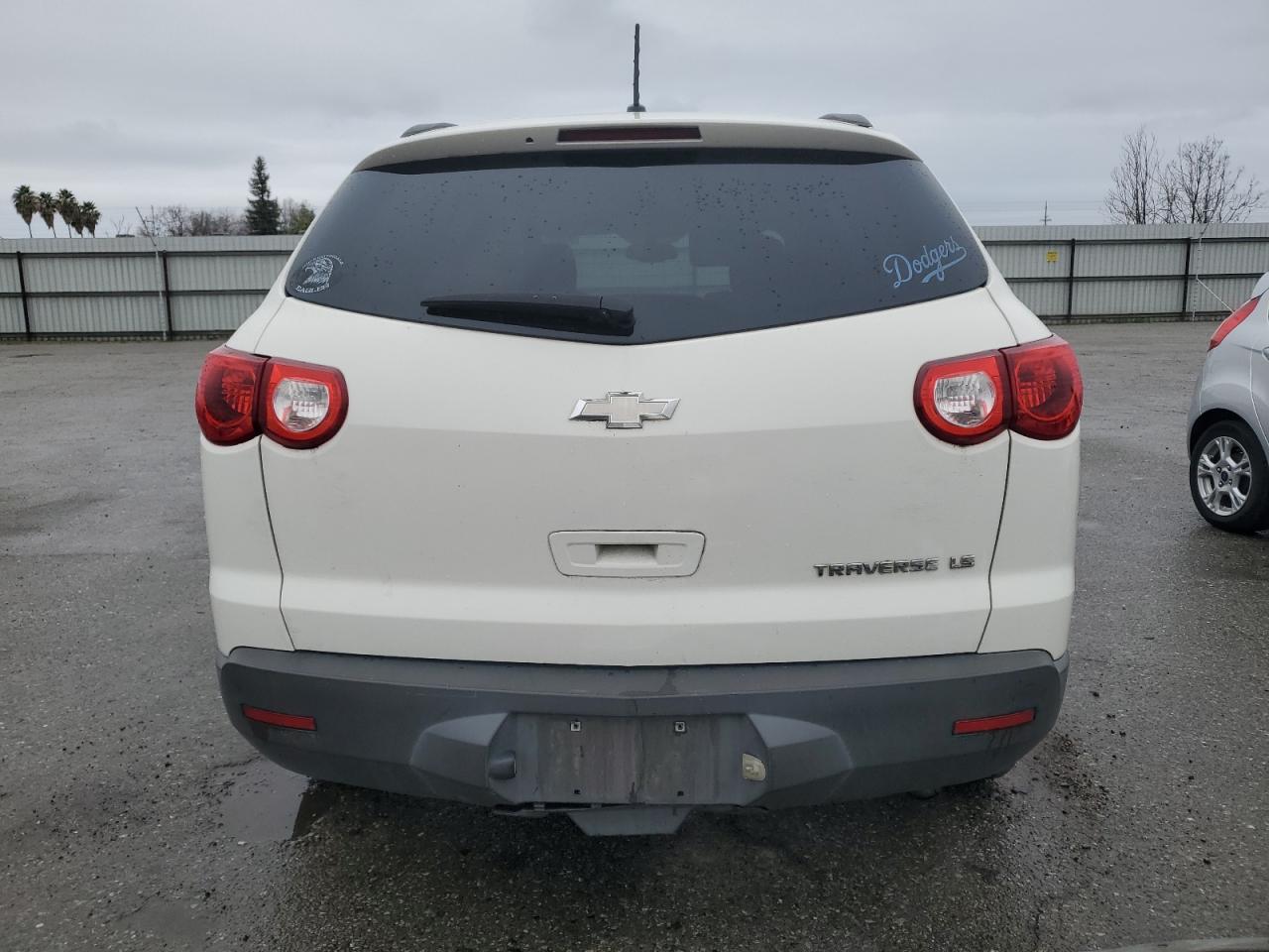 2010 Chevrolet Traverse VIN 1GNLREED5AJ241227 Copart auction photo, front end / side damage thumbnail 6