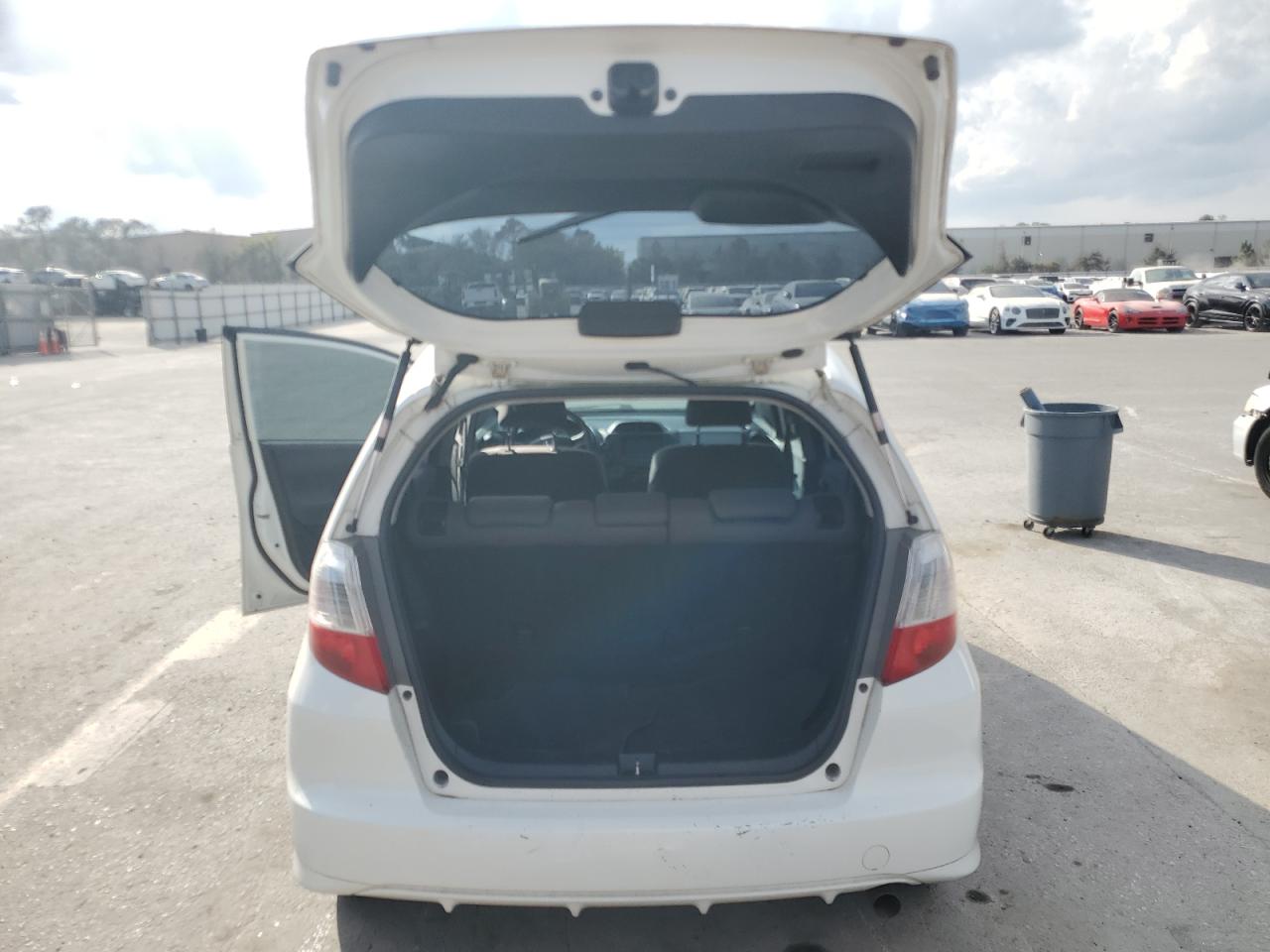 2010 Honda Fit VIN JHMGE8H22AS004706 Copart auction photo, front end / side damage thumbnail 6