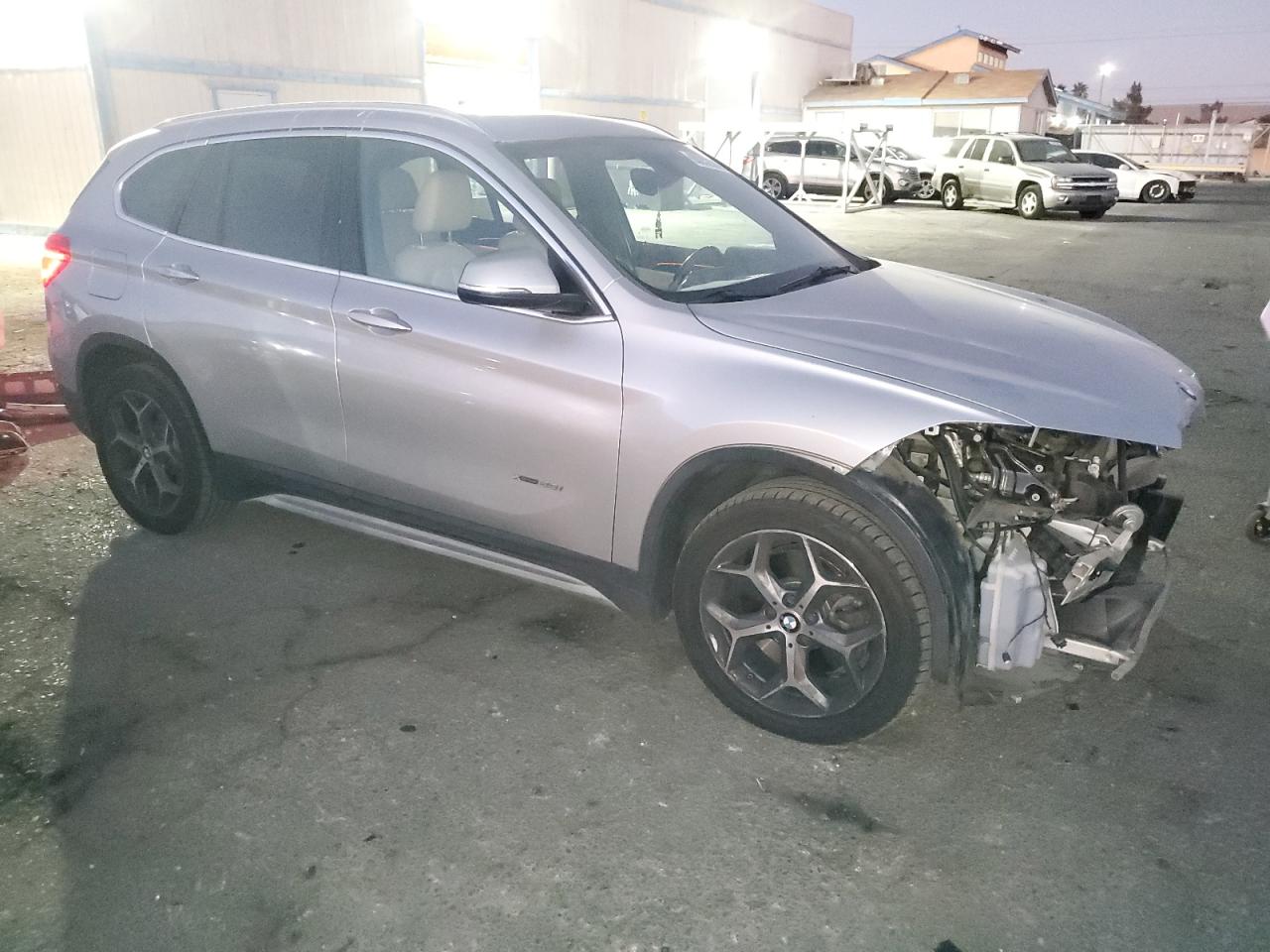 2017 BMW X1 VIN WBXHT3Z32H4A55942 Copart auction photo, front end damage thumbnail 4