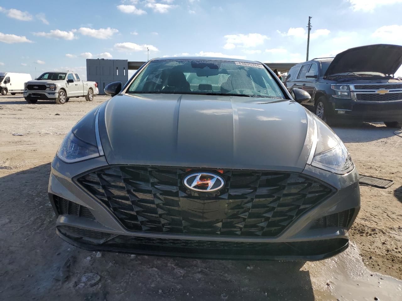 2023 Hyundai Sonata VIN KMHL64JA9PA254588 Copart auction photo, side / rear end damage thumbnail 5