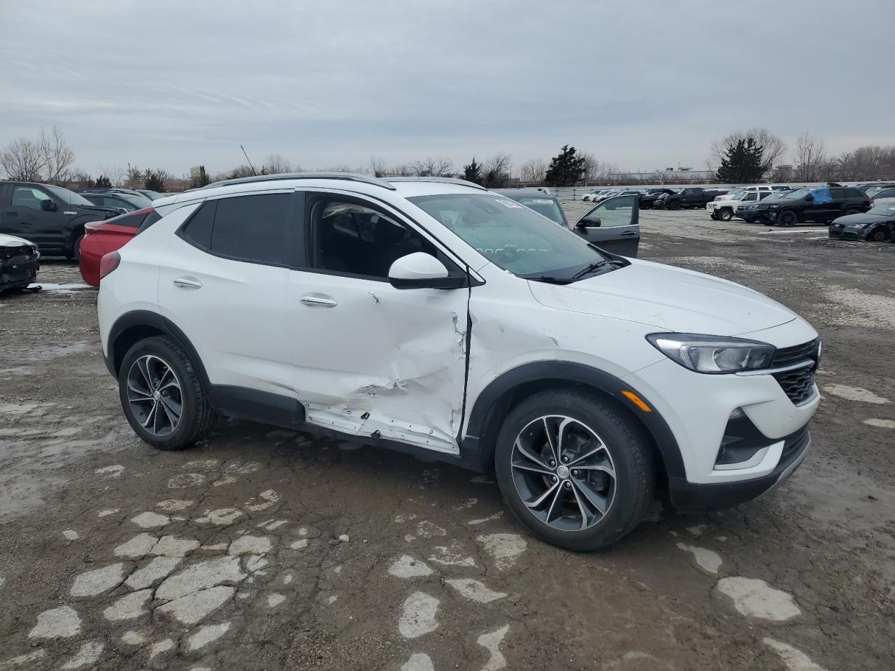 2021 Buick Encore VIN KL4MMDS2XMB118654 Copart auction photo, side / minor dent/scratches damage thumbnail 4