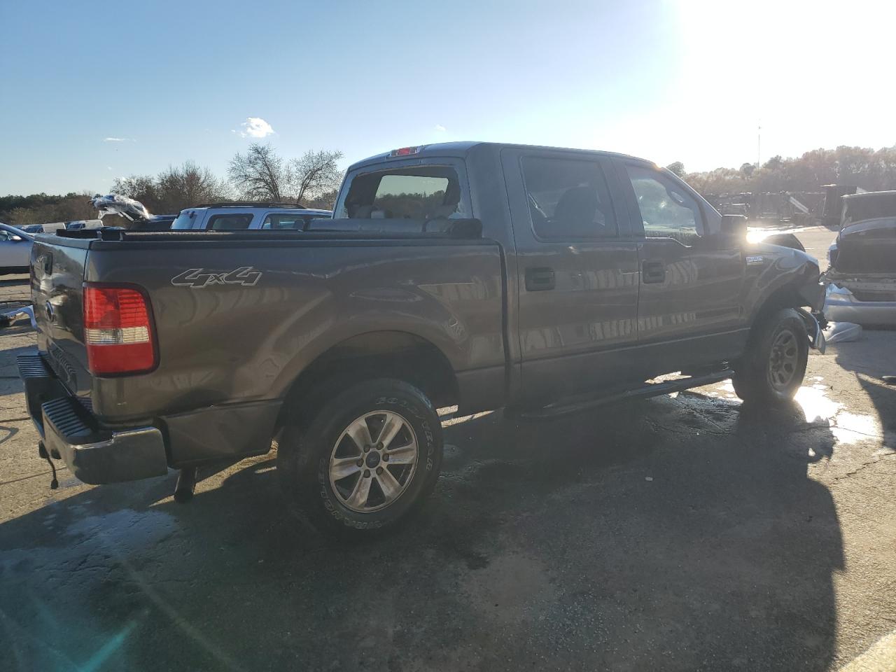 2004 Ford F-150 VIN 1FTPW14574KA34391 Copart auction photo, front end / all over damage thumbnail 3