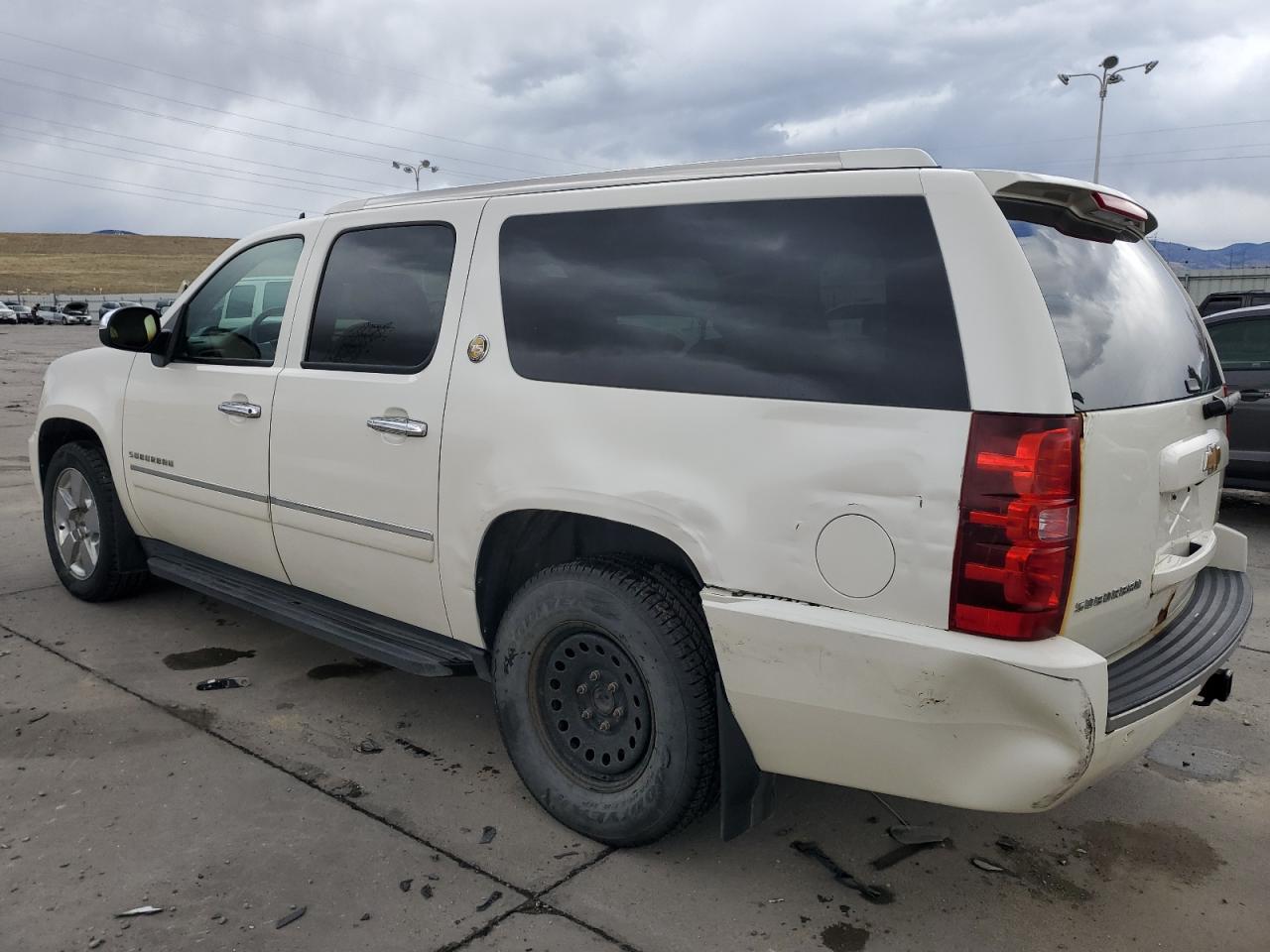 2010 Chevrolet Suburban VIN 1GNUKKE35AR292291 Copart auction photo, rear end / side damage thumbnail 2