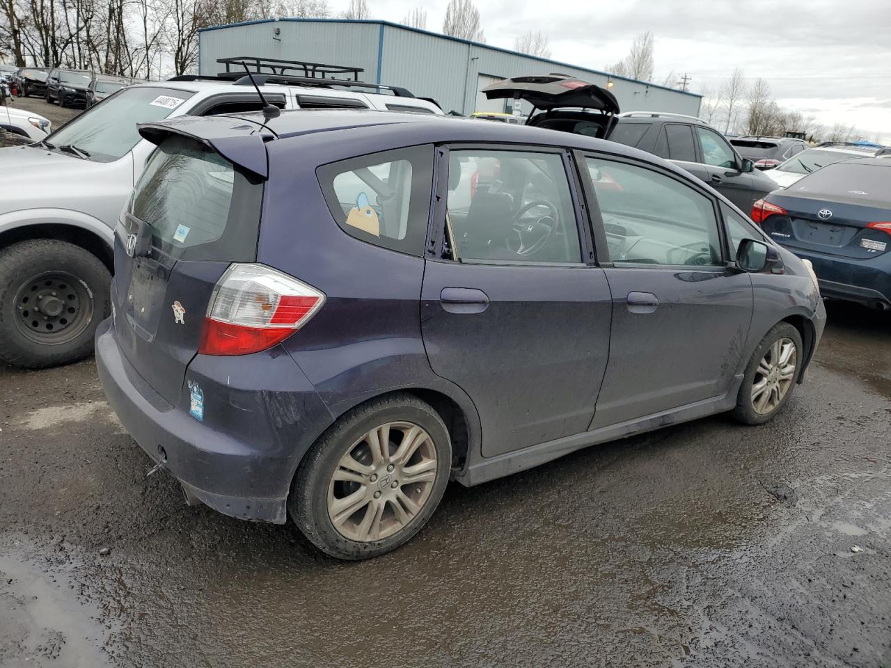 2010 Honda Fit VIN JHMGE8H41AC028247 Copart auction photo, side damage thumbnail 3