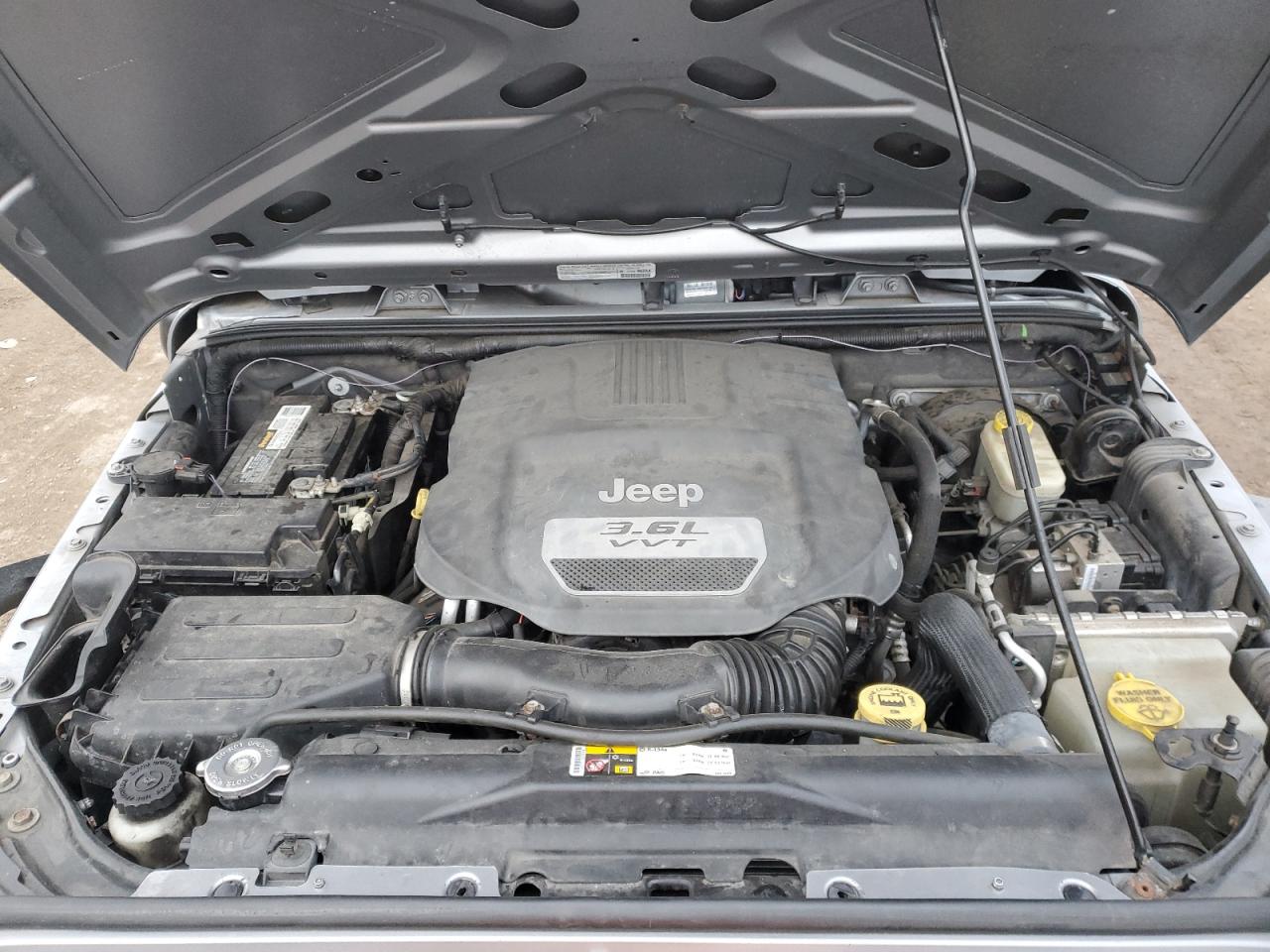 2013 Jeep Wrangler VIN 1C4BJWDG8DL584183 Copart auction photo, side / front end damage thumbnail 12