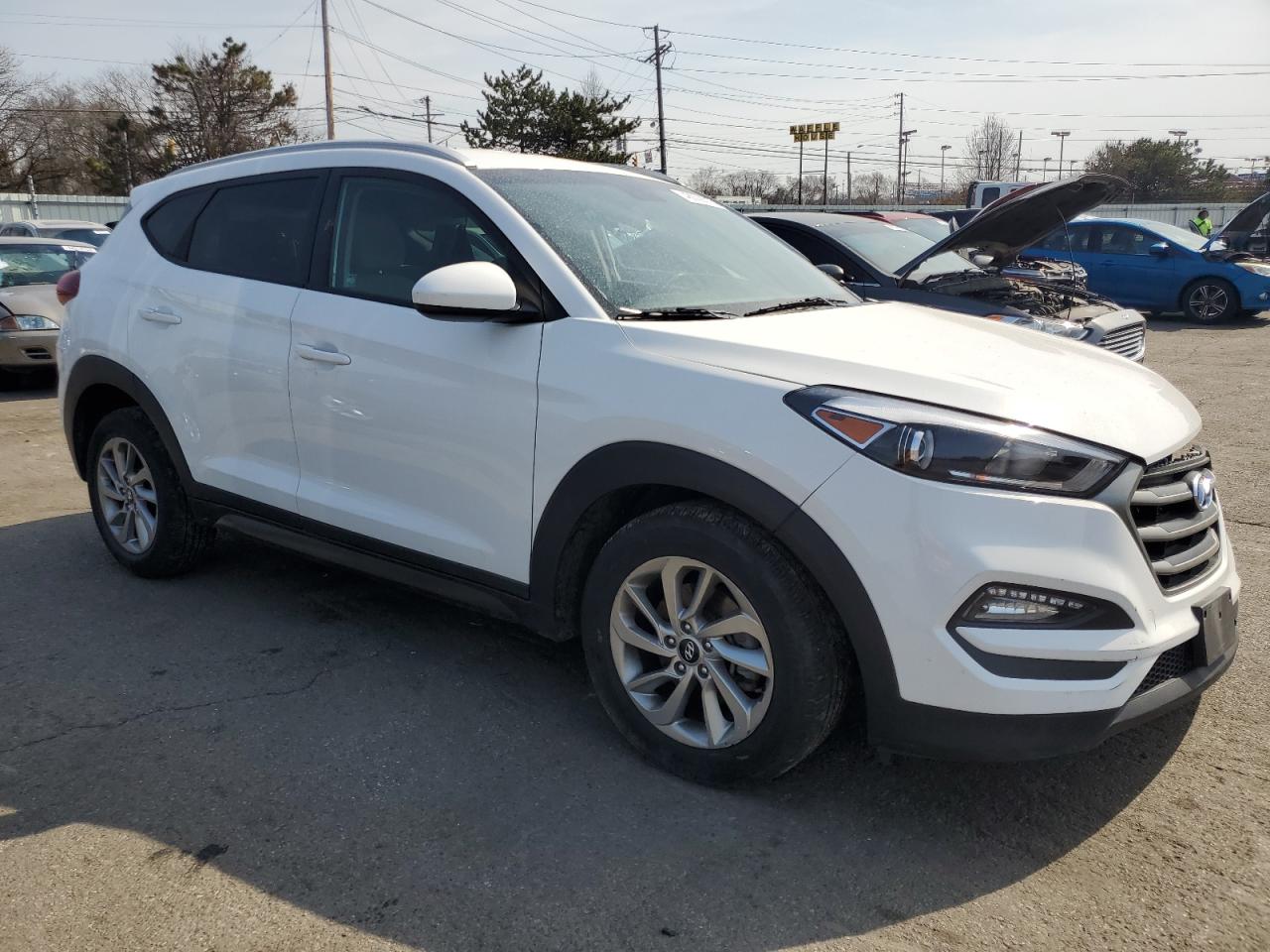 2016 Hyundai Tucson VIN KM8J3CA46GU129552 Copart auction photo, front end / side damage thumbnail 4