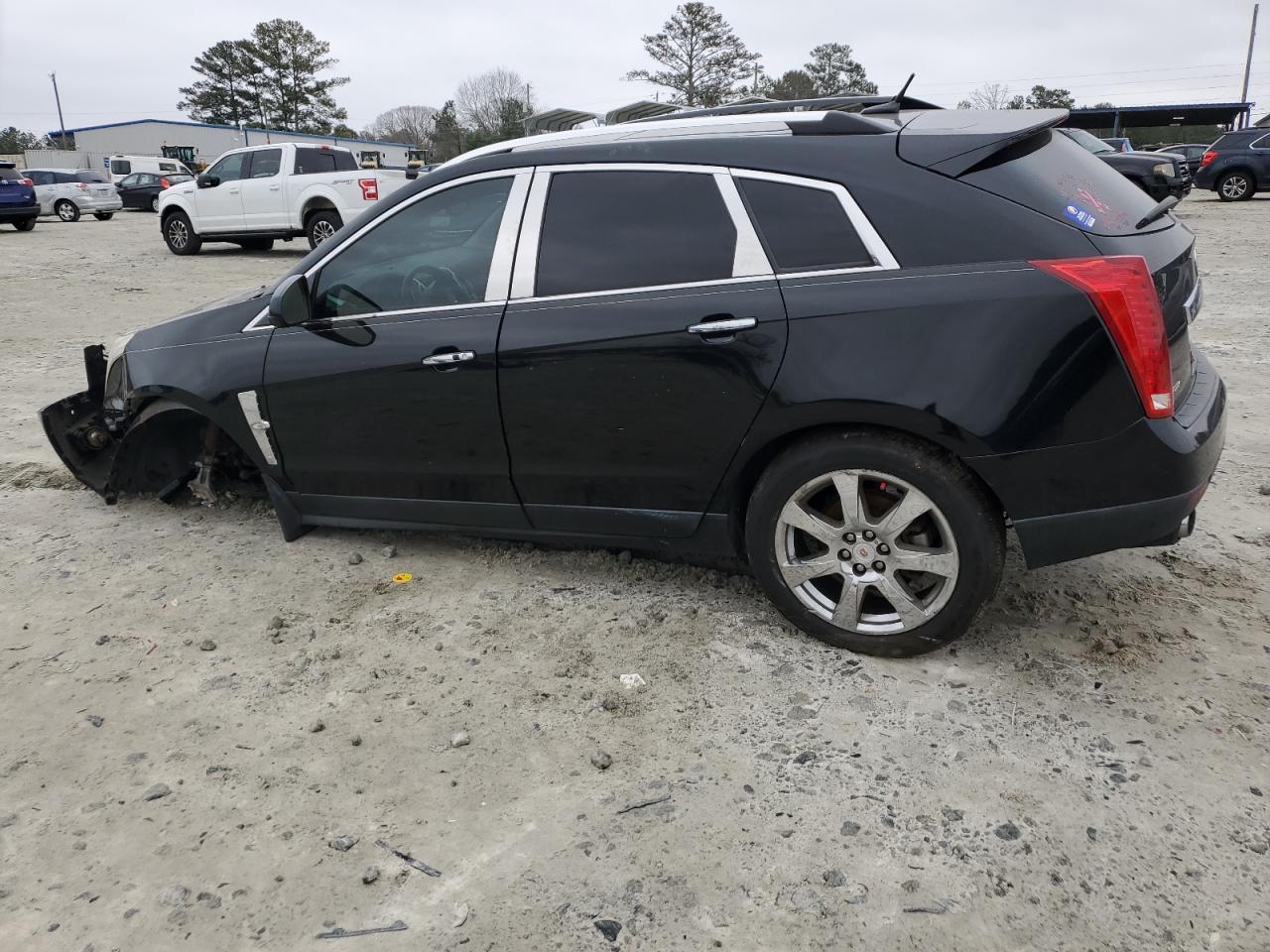 2012 Cadillac SRX VIN 3GYFNBE3XCS506632 Copart auction photo, front end / undercarriage damage thumbnail 2