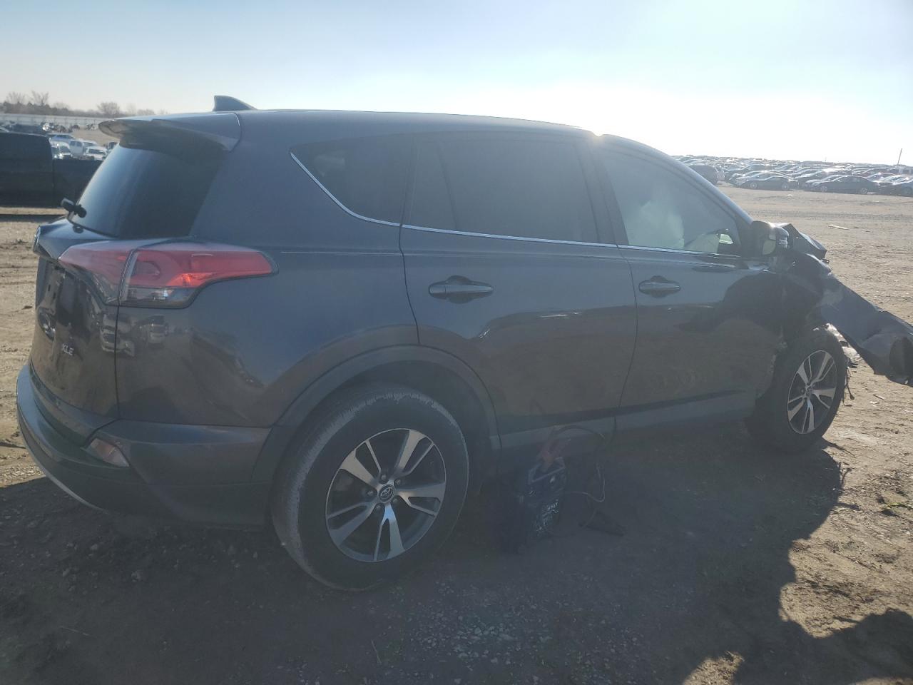 2018 Toyota RAV 4 VIN 2T3WFREV5JW428824 Copart auction photo, front end damage thumbnail 3