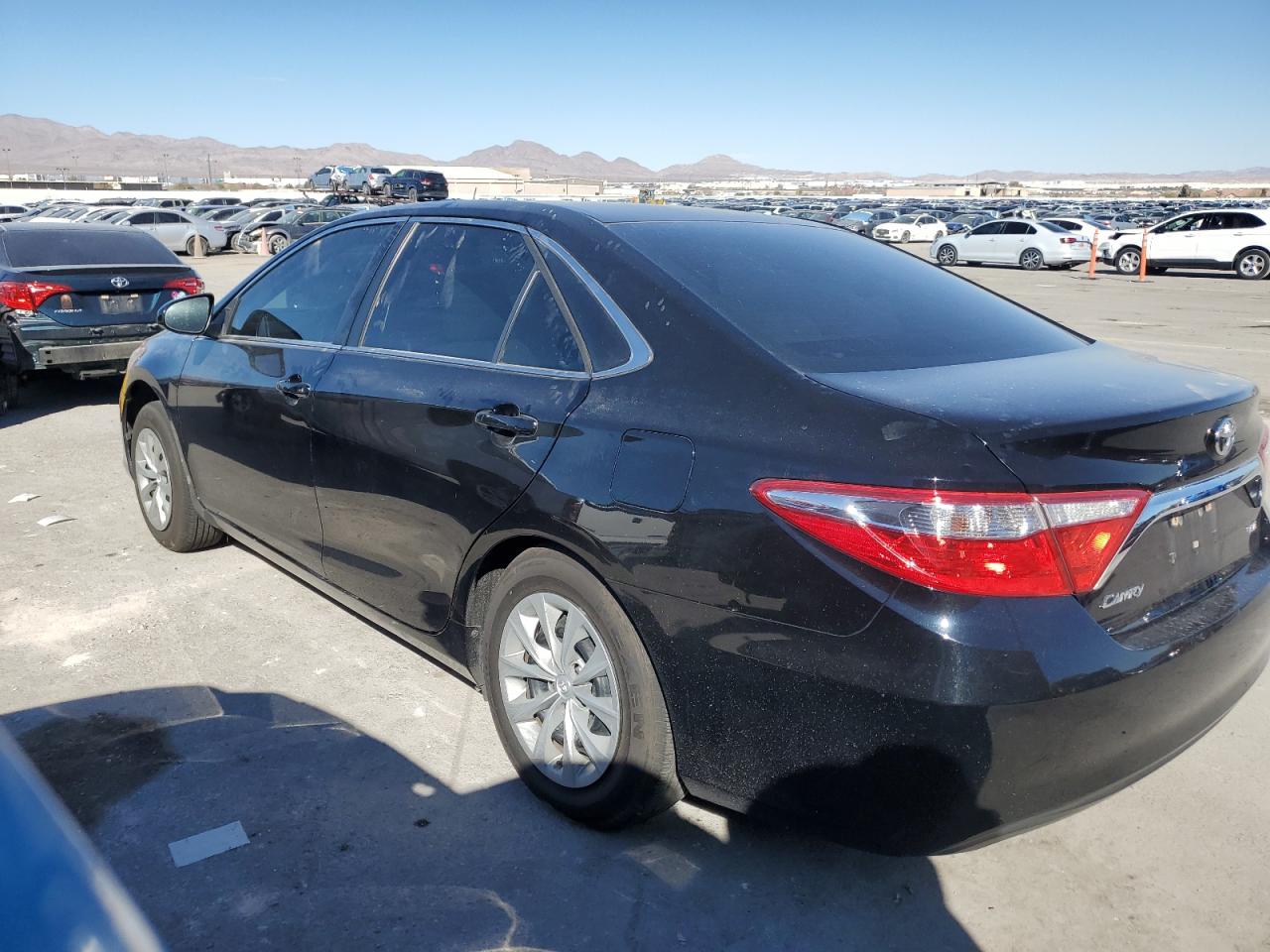 2016 Toyota Camry VIN 4T1BF1FK0GU250634 Copart auction photo, side / rear end damage thumbnail 2