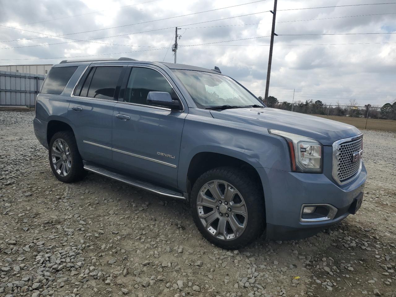 2015 GMC Yukon VIN 1GKS1CKJ9FR686142 Copart auction photo, stripped damage thumbnail 4