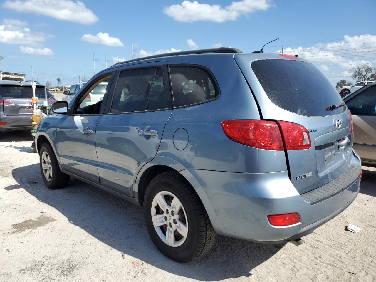 2009 Hyundai Santa Fe VIN 5NMSG13D09H266088 Copart auction photo, side / rear end damage thumbnail 2