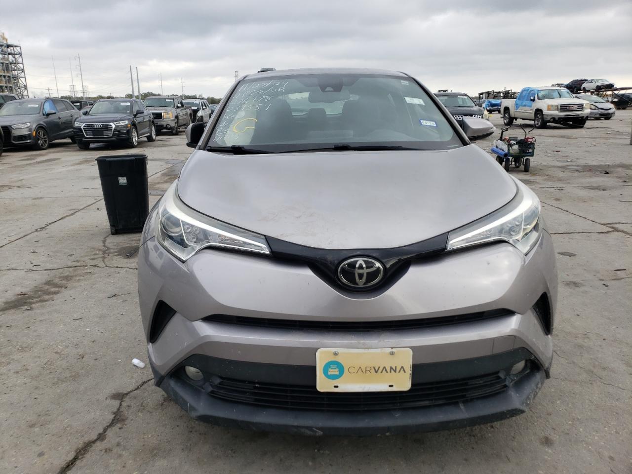 2018 Toyota C-HR VIN NMTKHMBX2JR034554 Copart auction photo, side damage thumbnail 5